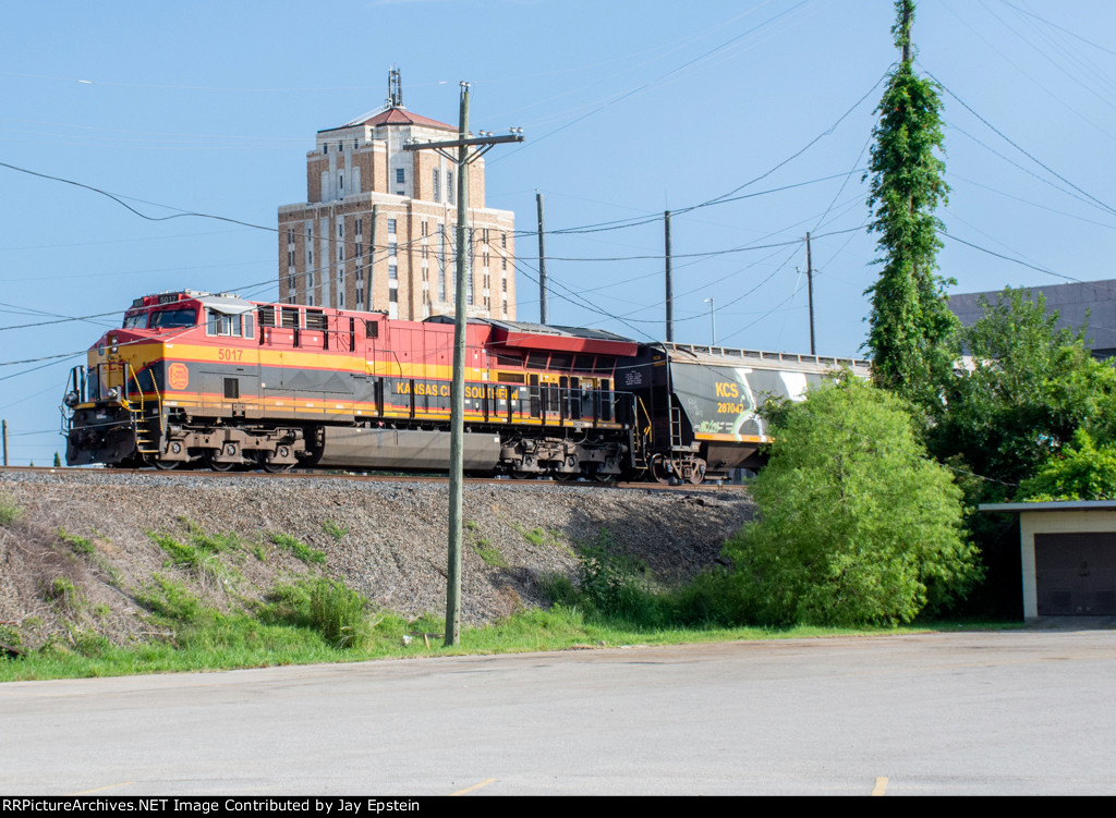 KCS 5017 passes beneath the Jefferson County Courthouse